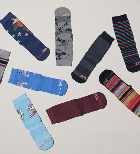 Assorted socks in a variety of patterns and solids